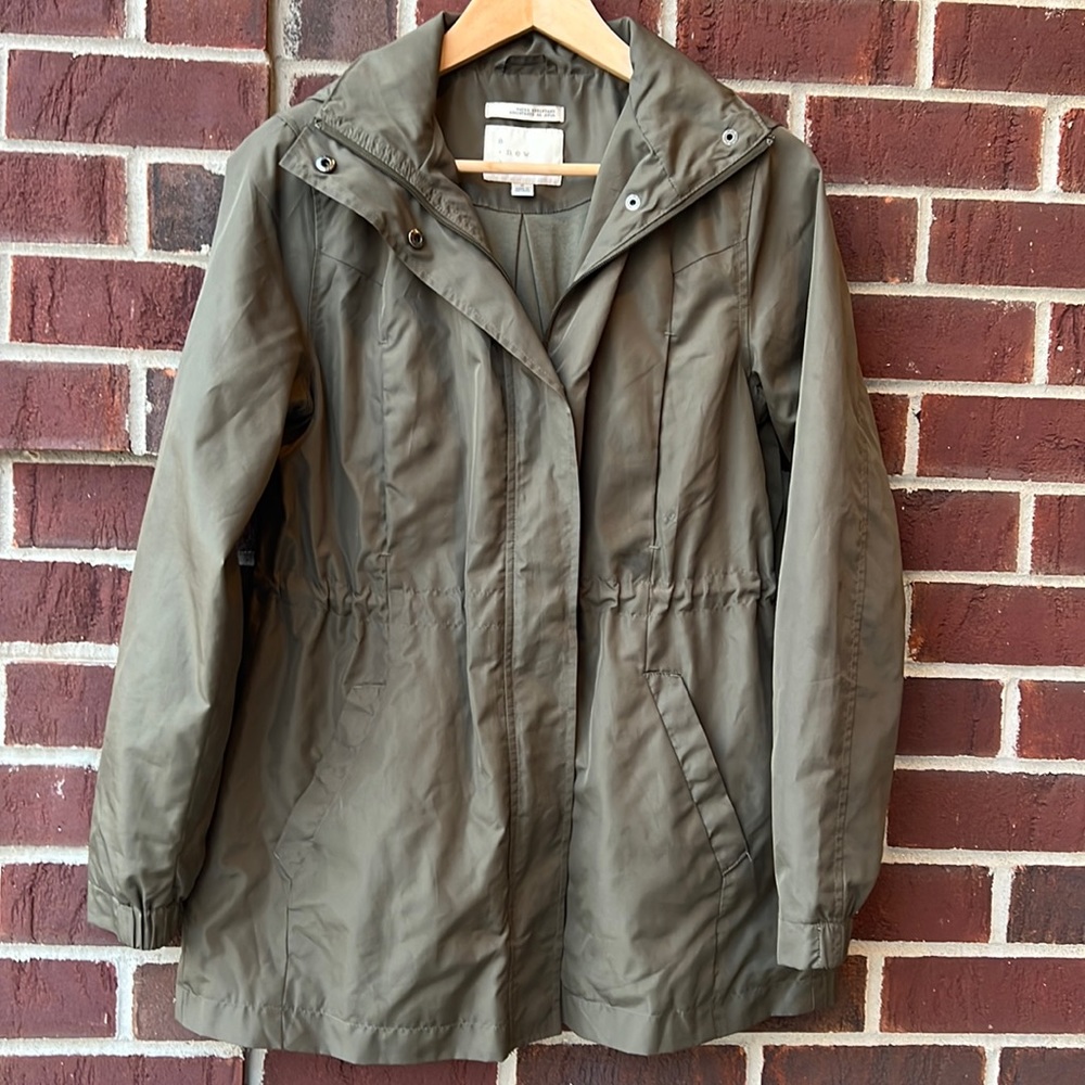 A new day green hooded drawstring waist water resistant jacket